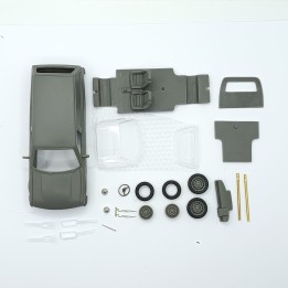 Pièces du kit Peugeot 305 Break tôlée 1:43 disposées à plat avant assemblage