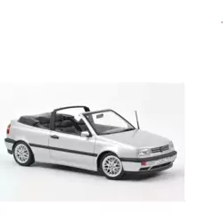 Marketplace : VOLKSWAGEN GOLF cabriolet de 1995 argent - Norev - 1:18