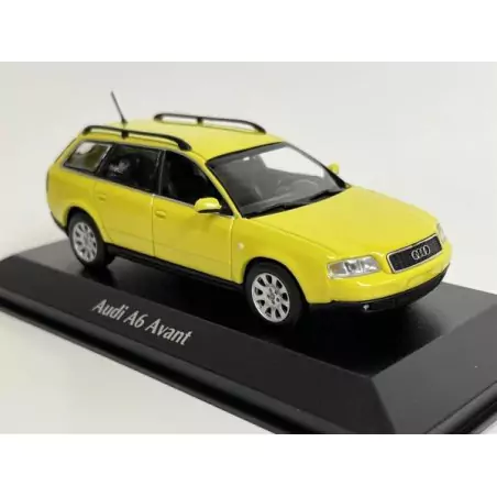 Marketplace : AUDI A6 Avant 1997 Jaune - Maxichamps - 1:43
