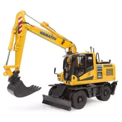 Marketplace : Pelle sur pneus KOMATSU PW180-11 avec godet et martea...